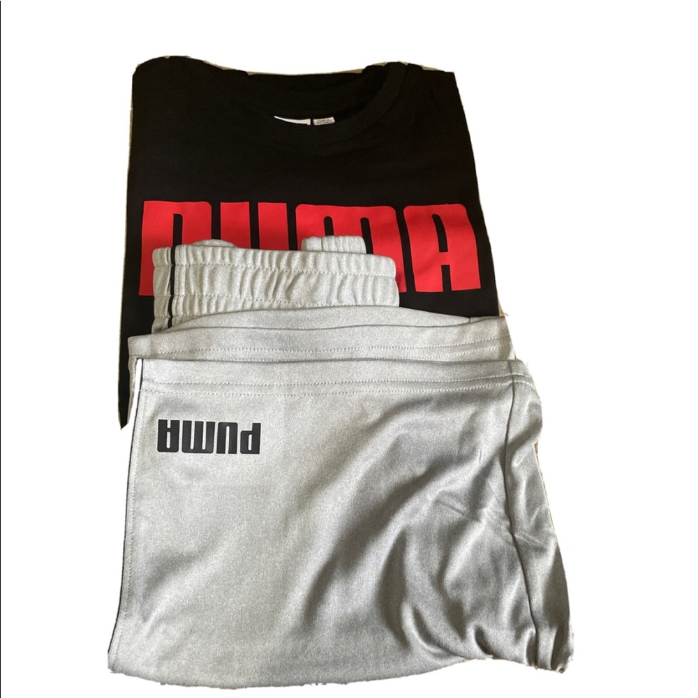 Puma boys 2 piece set Size M 10-12. 
Shorts -Polyester Shirt -Cotton